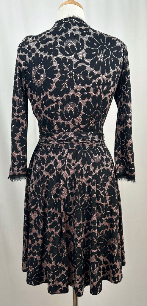 Diane Von Furstenberg lace pattern wrap dress (size 8)