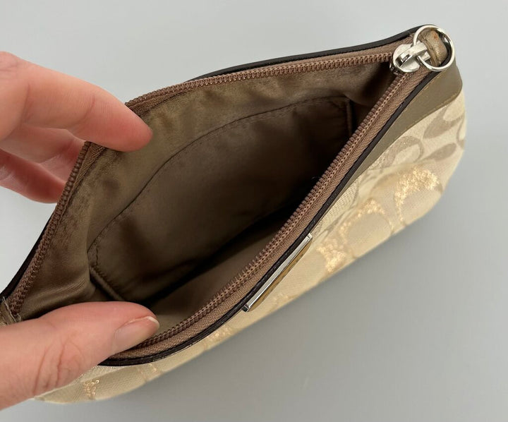 Coach bronze/gold fabric wristlet