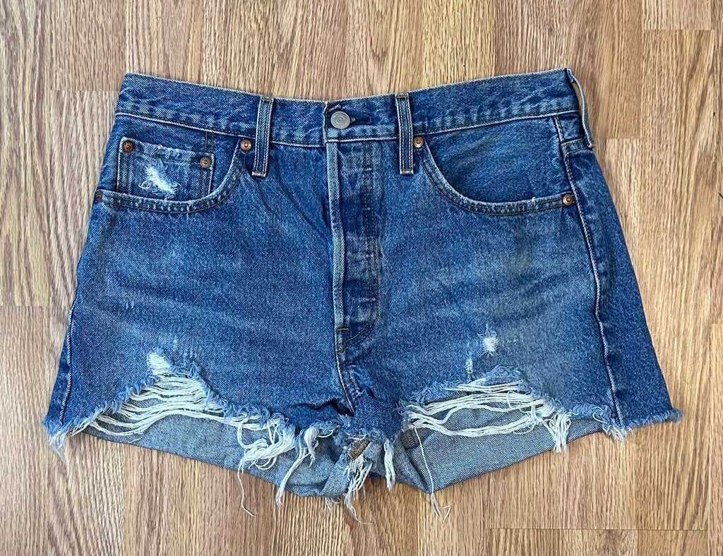 Levi's distressed mini cutoffs (size 29)