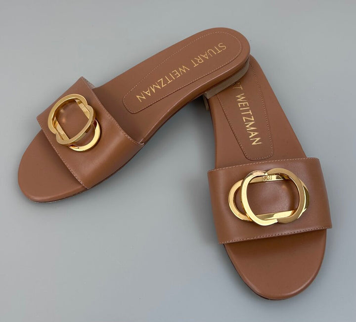 Stuart Weitzman gold buckle leather slides (size 6)