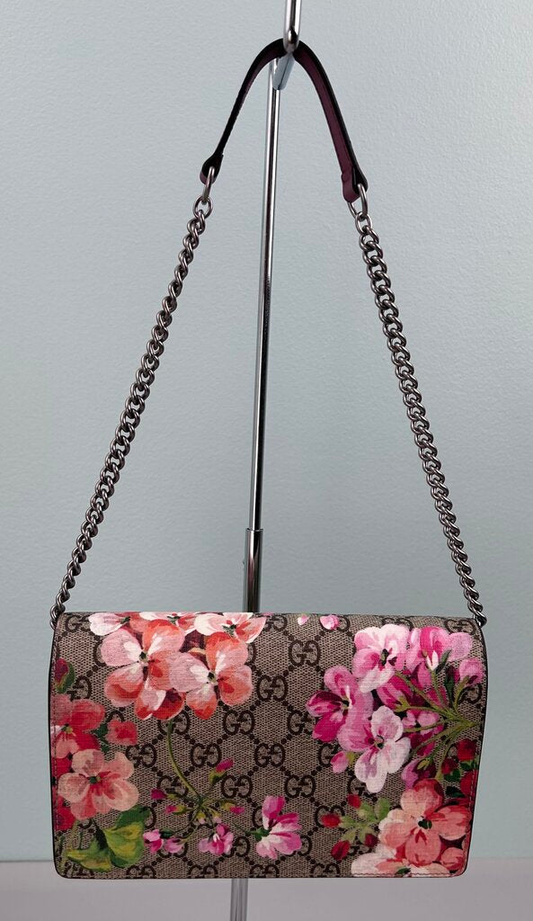 Gucci GG Supreme Bloom wallet on chain